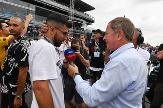 Martin Brundle, Sky TV talks with Sergio Aguero, Footballer, on the grid