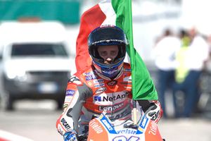 Race winner Andrea Dovizioso, Ducati Team with the italian flag