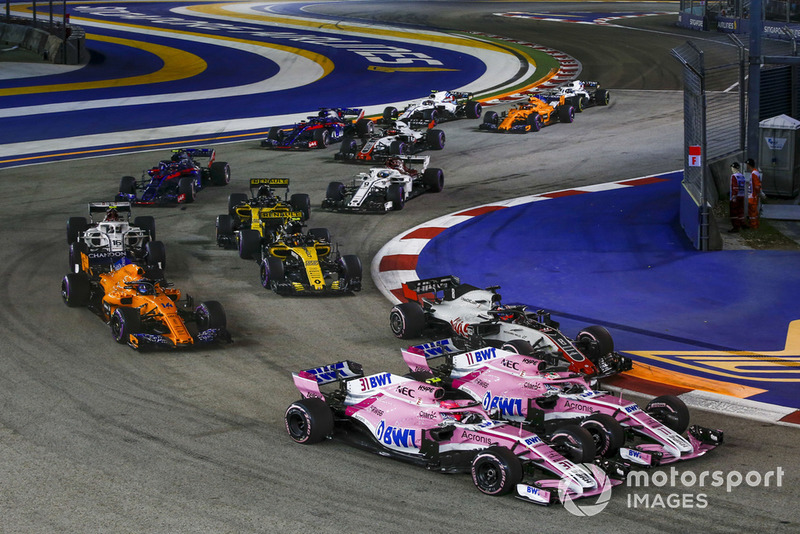 Esteban Ocon, Racing Point Force India VJM11, Sergio Perez, Racing Point Force India VJM11 and Romain Grosjean, Haas F1 Team VF-18 