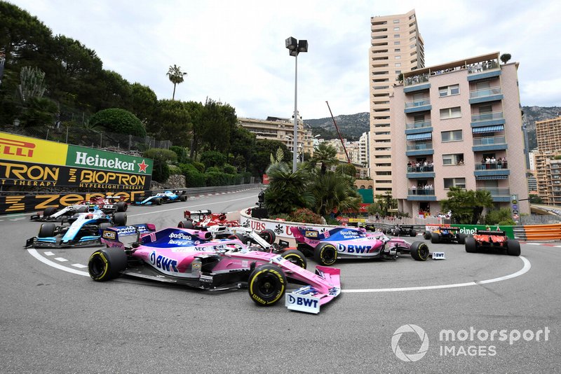 Lance Stroll, Racing Point RP19, leads Kimi Raikkonen, Alfa Romeo Racing C38, and Sergio Perez, Racing Point RP19