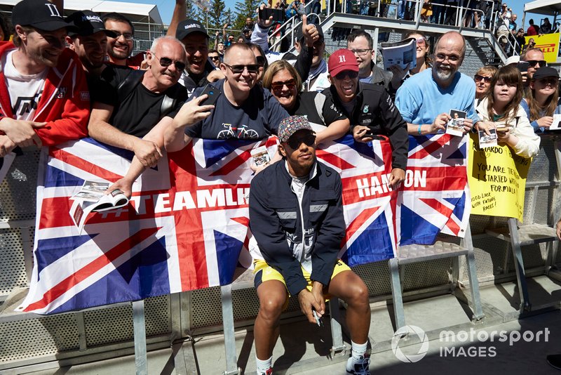 Lewis Hamilton, Mercedes AMG F1 poses for a photograph with Team LH fans