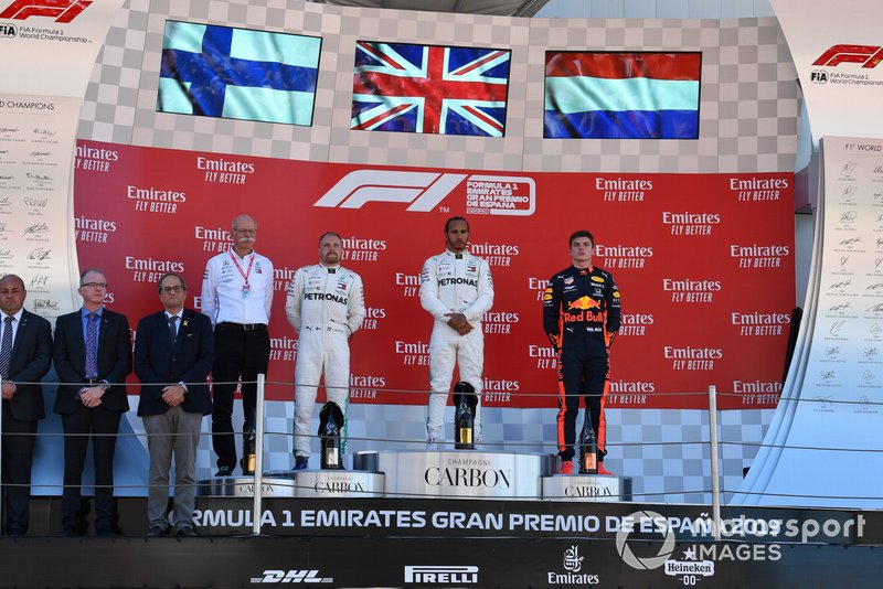 Dr Dieter Zetsche, CEO, Mercedes Benz Valtteri Bottas, Mercedes AMG F1, 2nd position, Lewis Hamilton, Mercedes AMG F1, 1st position, and Max Verstappen, Red Bull Racing, 3rd position, on the podium