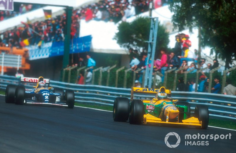 Michael Schumacher, Benetton B193B followed by Alain Prost, Williams FW15C 