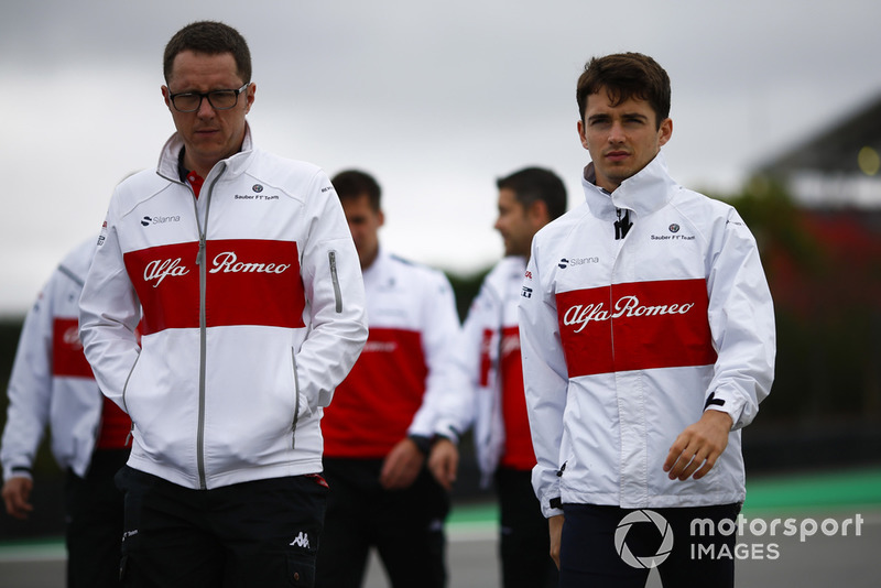 Charles Leclerc, Sauber, walks the circuit with colleagues