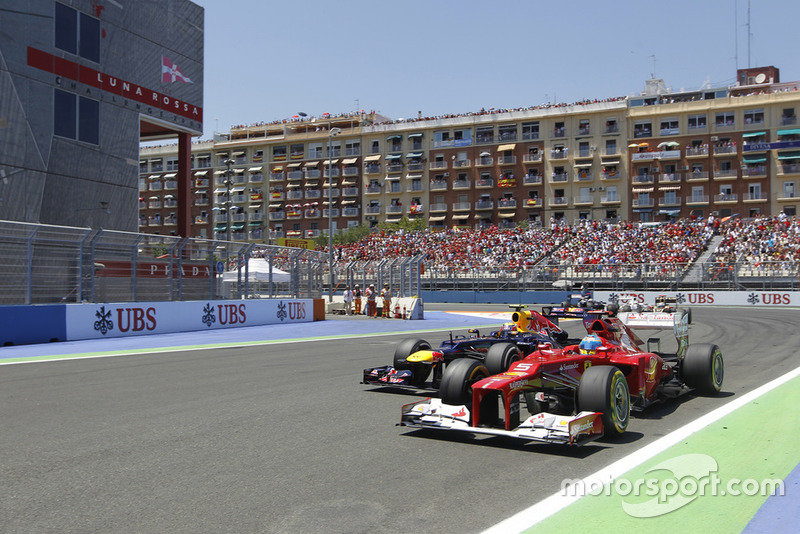 Fernando Alonso, Ferrari F2012, holds off Mark Webber, Red Bull RB8 Renault