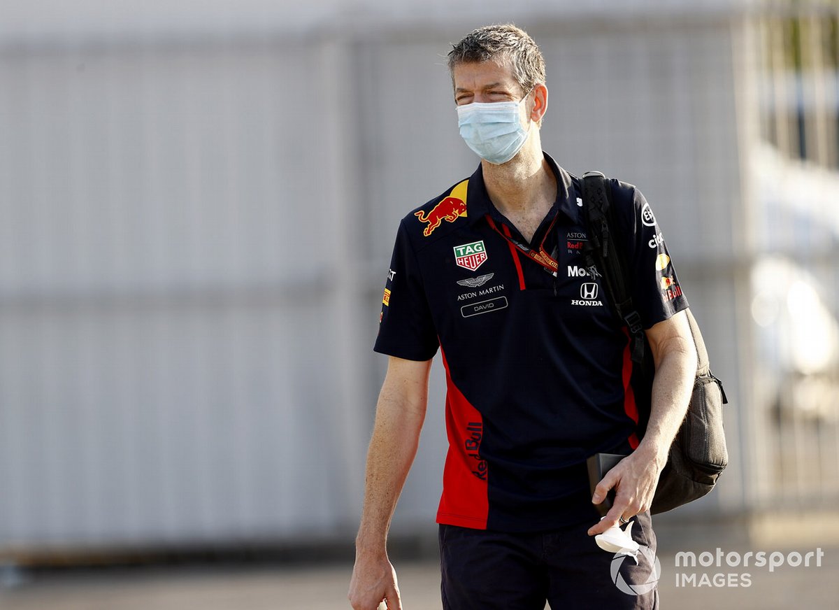 Red Bull team members arrive at the track