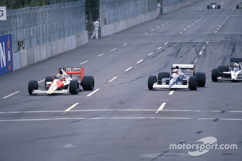 Ayrton Senna, McLaren MP4-5B Honda, leads Jean Alesi, Tyrrell 018 Ford, and Gregor Foitek, Brabham BT58 Judd