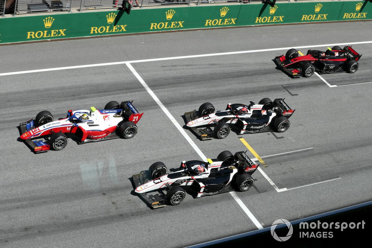 Robert Shwartzman, Prema Racing, leads Christian Lundgaard, ART Grand Prix, Marcus Armstrong, ART Grand Prix, and Callum Ilott, UNI-Virtuosi, at the start of the race