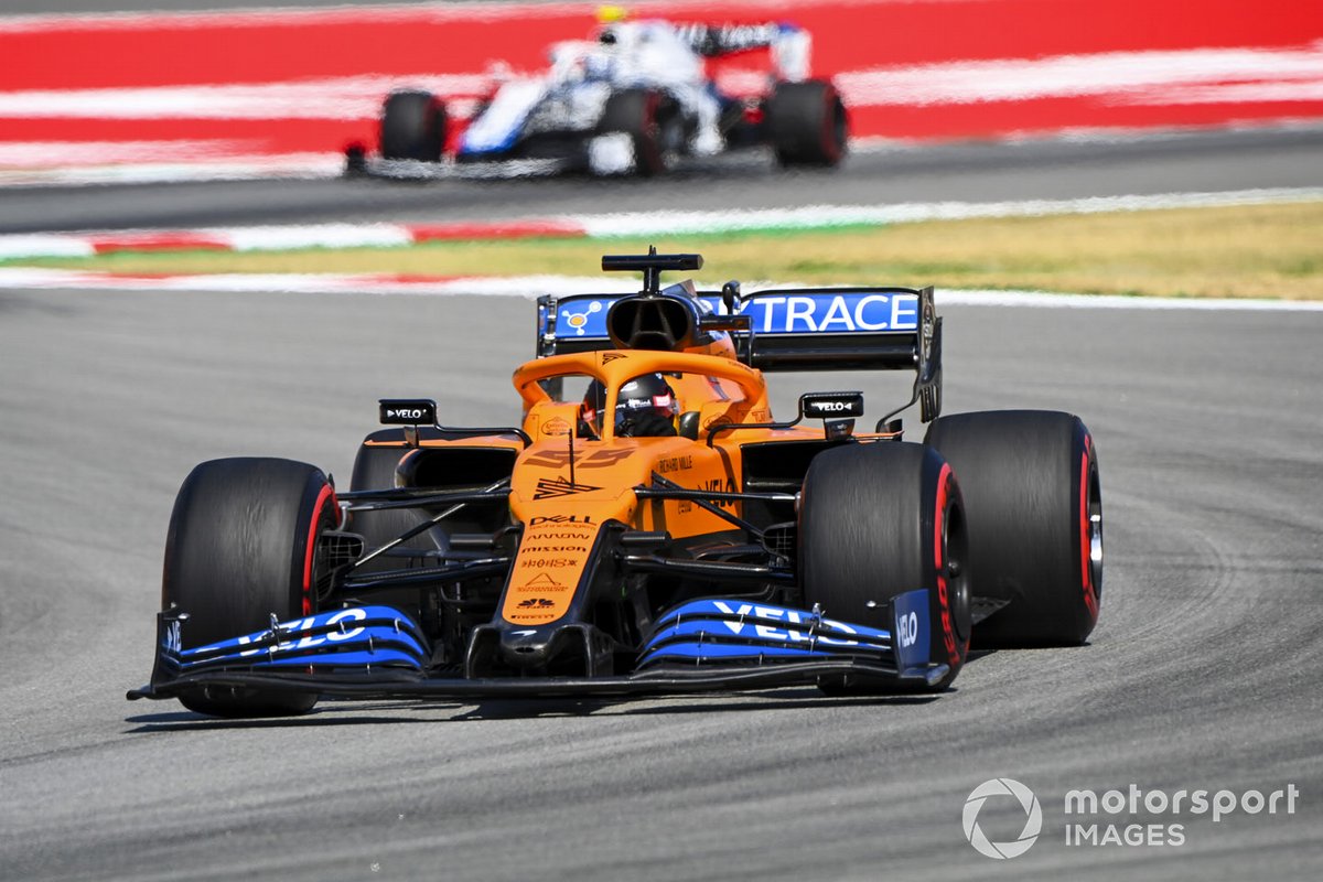 Carlos Sainz Jr., McLaren MCL35, leads Nicholas Latifi, Williams FW43