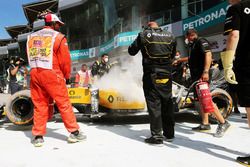 The burned car of Kevin Magnussen, Renault Sport F1 Team RS16