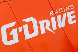 G-Drive Racing paddock area dan logo