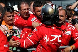 Sebastian Vettel, Ferrari celebrates in parc ferme, the team