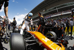 Fernando Alonso, McLaren MCL32, climbs from his car