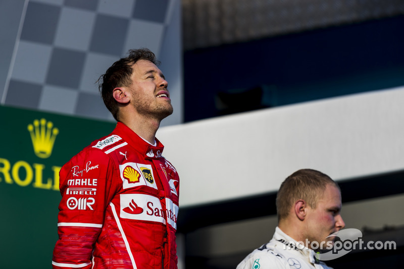 Sebastian Vettel, Ferrari y Valtteri Bottas, Mercedes AMG.