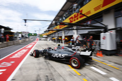 Kevin Magnussen, Haas F1 Team VF-17, leaves his pit garage