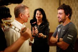 Fernando Alonso talks to the media after announcing his deal to race in the 2017 Indianapolis 500 in