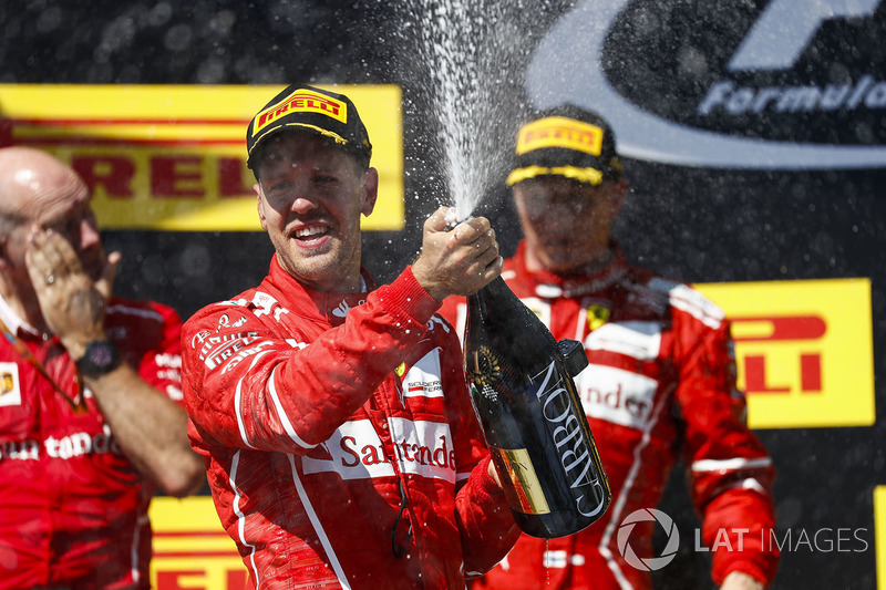 Podio: ganador de la carrera Sebastian Vettel, Ferrari