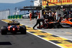  Fernando Alonso, McLaren MCL32, heads out as Stoffel Vandoorne, McLaren MCL32, is returned to the garage