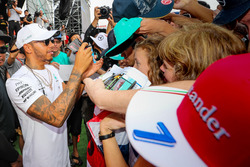 Lewis Hamilton, Mercedes AMG F1 signs autographs for the fans