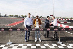 COTA chairman Bobby Epstein and Lewis Hamilton, Mercedes AMG F1, open the kart track