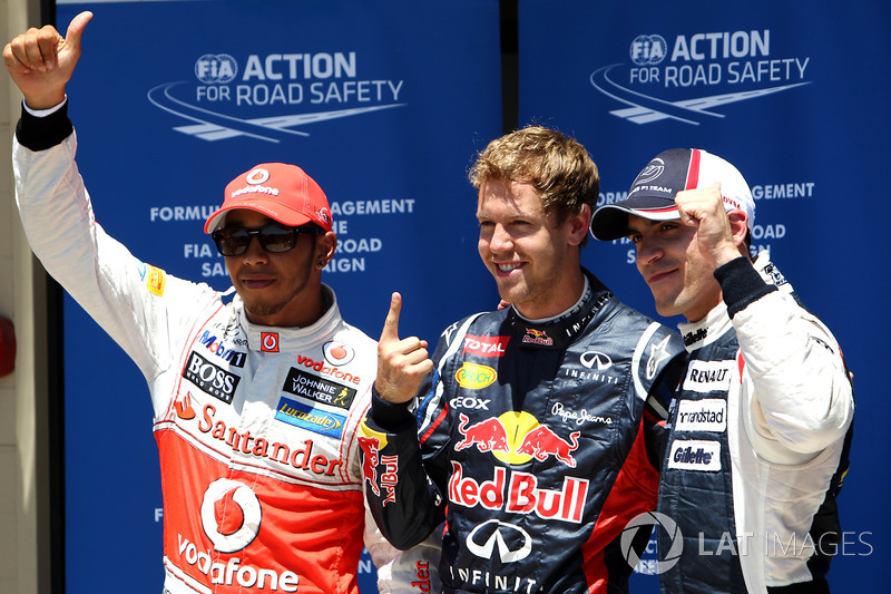 Top three qualifiers Sebastian Vettel, Red Bull Racing, Lewis Hamilton, McLaren, and Pastor Maldonado, Williams F1 Team