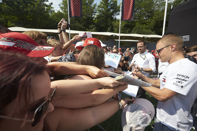 Valtteri Bottas, Mercedes AMG F1, signs autographs for fans