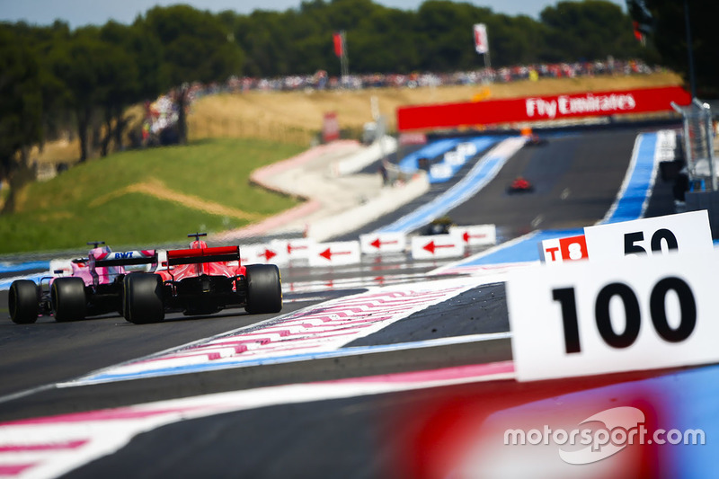 Sergio Perez, Force India VJM11, leads Kimi Raikkonen, Ferrari SF71H