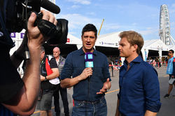 TV Presenter Vernon Kaye, Nico Rosberg in the paddock