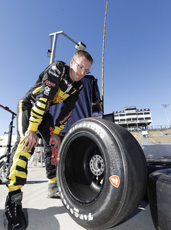 Sébastien Bourdais, Dale Coyne Racing with Vasser-Sullivan Honda examines his Firestone tires