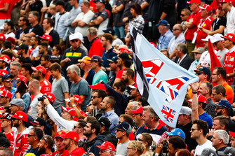 A flag of support for Lewis Hamilton, Mercedes AMG F1, among a sea of Ferrari fans