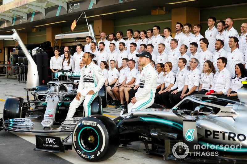 Lewis Hamilton, Mercedes AMG F1, poses for a group photo alongside Valtteri Bottas, Mercedes AMG F1