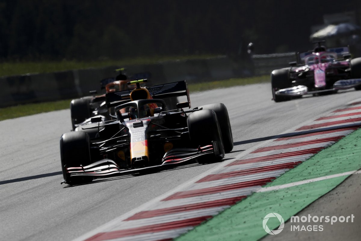 Alex Albon, Red Bull Racing RB16, leads Lando Norris, McLaren MCL35, and Sergio Perez, Racing Point RP20