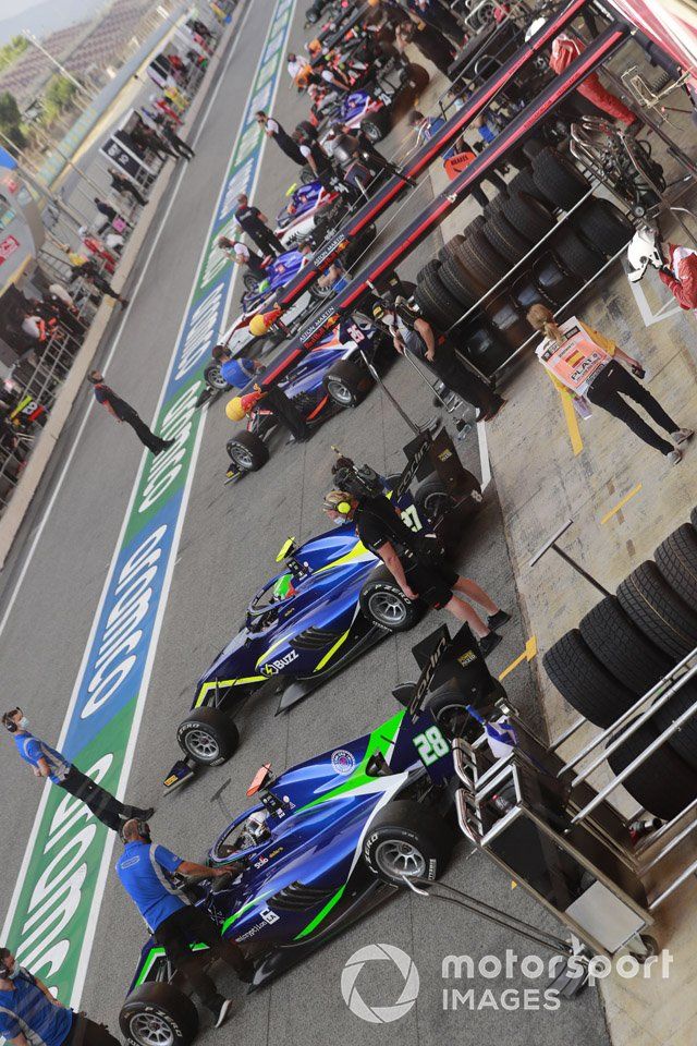 F3 Cars In The Pit Lane, Including Cameron Das, Carlin Buzz Racing, Leonardo Pulcini, Carlin Buzz Racing 
