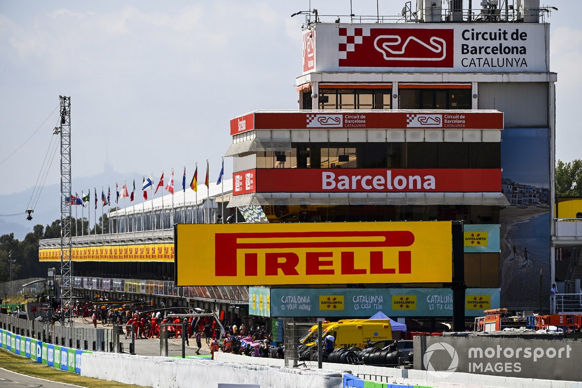 Cars in the busy pit lane