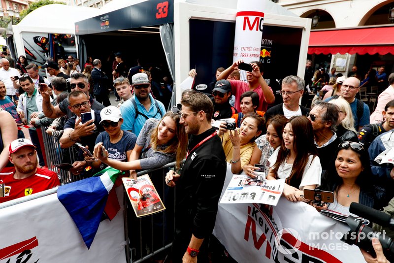 Romain Grosjean, Haas F1 poses for a selfie with a fan