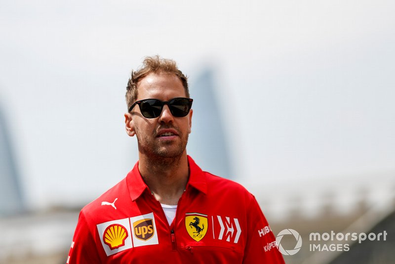 Sebastian Vettel, Ferrari walks the track with his engineers