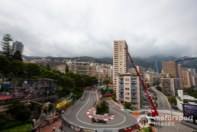 Romain Grosjean, Haas F1 Team VF-19, leads Antonio Giovinazzi, Alfa Romeo Racing C38