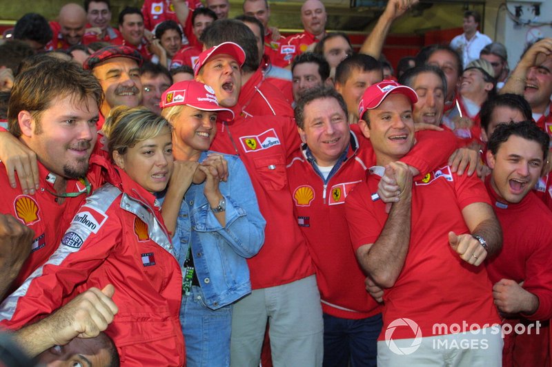 Michael Schumacher, Ferrari, celebrates with the team after winning