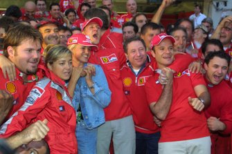 Michael Schumacher, Ferrari, celebrates with the team after winning