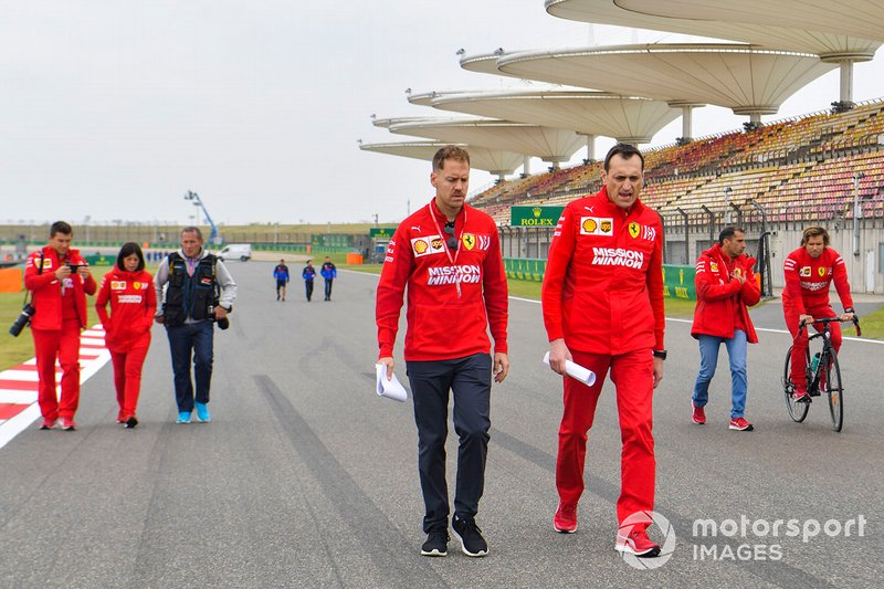 Sebastian Vettel, Ferrari walks the track with his team