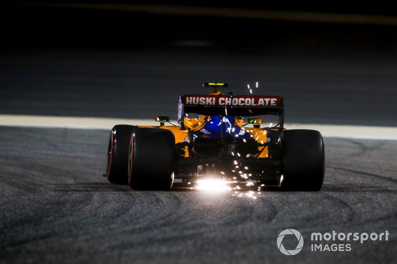 Sparks fly from the rear of Lando Norris, McLaren MCL34