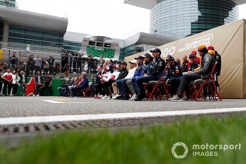 Drivers and team members gather for an F1 1000 photo call