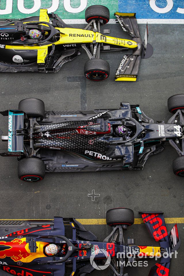 Lewis Hamilton, Mercedes F1 W11, 1st position, Max Verstappen, Red Bull Racing RB16, 2nd position, and Daniel Ricciardo, Renault F1 Team R.S.20, 3rd position, in parc ferme