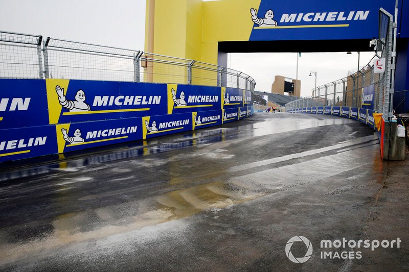 Marshals clear the track