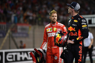 Sebastian Vettel, Ferrari e Max Verstappen, Red Bull Racing, festeggiano nel parco chiuso