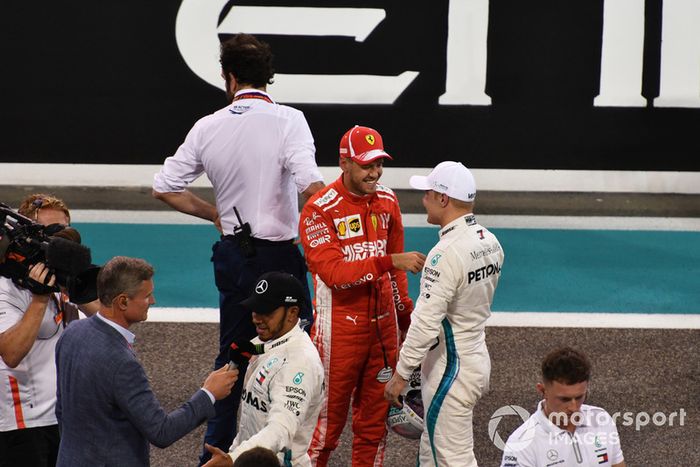 Sebastian Vettel, Ferrari y Valtteri Bottas, Mercedes AMG F1 en Parc Ferme 