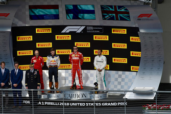 (L to R): Carlo Santi, Ferrari Race Engineer, Max Verstappen, Red Bull Racing, Kimi Raikkonen, Ferrari and Lewis Hamilton, Mercedes AMG F1 on the podium
