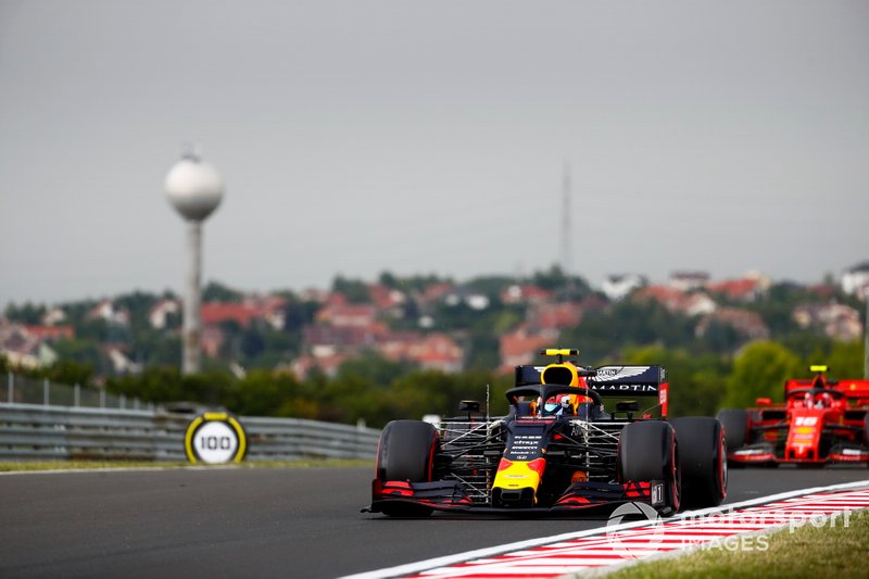 Pierre Gasly, Red Bull Racing RB15, leads Charles Leclerc, Ferrari SF90