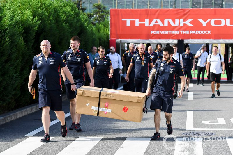 Red Bull Racing mechanics arrive with parts