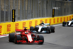 Sebastian Vettel, Ferrari SF71H, leads Lewis Hamilton, Mercedes AMG F1 W09, and Valtteri Bottas, Mercedes AMG F1 W09